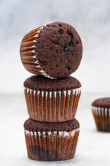Chocolate cupcake on the vintage background