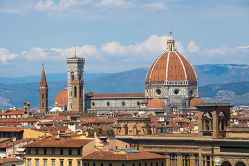 Fototapeta na wymiar Beautiful view of the picturesque city of Florence and the Basilica di Santa Maria del Fiore (Basilica of Saint Mary of the Flower). Florence, Central Italy, Tuscany region