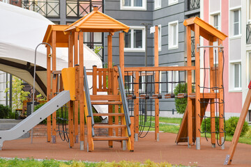 Fototapeta na wymiar Ecco playground. Modern wooden horizontal bar