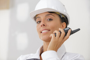 a female builder with radio