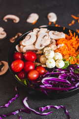 gourmet salad food photography with dark background and selective focus