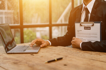 Application for jobs and interviews concept, female is hoping for a resume and recruiter considering application, hr manager making hiring decision.