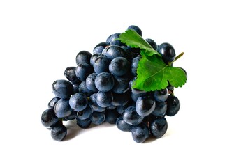 black grapes with green leaves isolated on white background