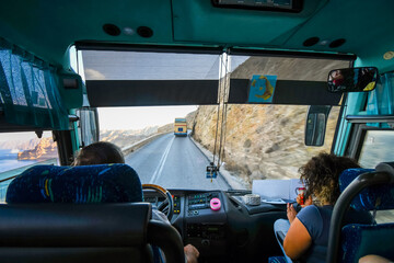 View from a tour bus traveling on the winding hillside road from Thera to the cruise port on the...