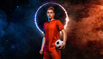 Soccer player. Athlete in football sportswear on game with ball. Sport concept.