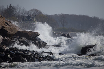 Ocean waves crashing on a rocky shore