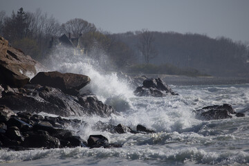 Ocean waves crashing on a rocky shore