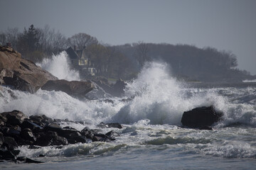 Ocean waves crashing on a rocky shore