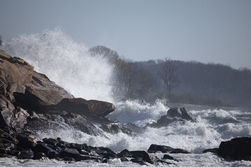 Ocean waves crashing on a rocky shore