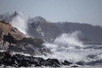 Ocean waves crashing on a rocky shore
