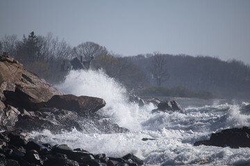 Ocean waves crashing on a rocky shore