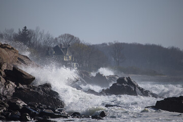Ocean waves crashing on a rocky shore