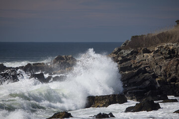 Ocean waves splashing on a rocky shore