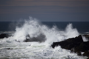 Ocean waves splashing on a rocky shore