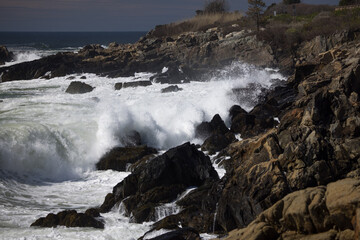 Ocean waves crashing on a rocky shore