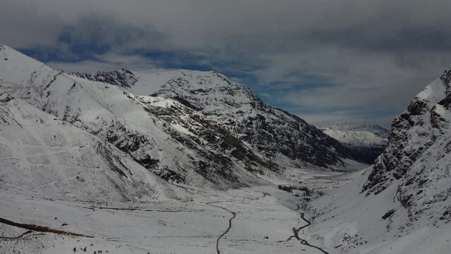 Trekking in winter season. Snowed mountains in La Egorda Valley, Caj n del Maipo, central Andes mountain range, Chile 