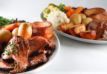 Roast beef, Yorkshire pudding, gravy and fresh vegetables