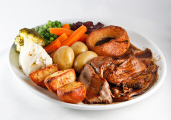 Roast beef, Yorkshire pudding, gravy and fresh vegetables