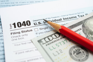 Fototapeta premium Tax form 1040 U.S. Individual Income Tax Return, business finance concept.