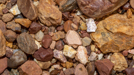 Abstract nature pebbles background. Brown pebbles texture. Stone background. Natural seamless stone texture background