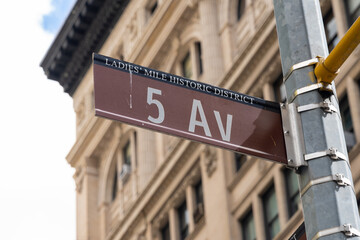New York City, USA - August 22, 2022: Close up of 5 AV street sign is seen in New York City, USA. 5 AV (Fifth Avenue) is a major thoroughfare in the borough of Manhattan. 