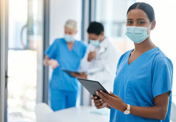 Healthcare, doctor or a nurse on a tablet, consulting in a hospital boardroom. Medical workers...
