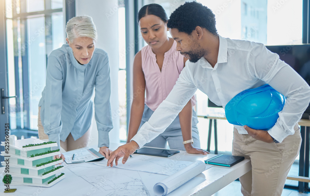 Poster design, construction and an architect in an office with blueprints, a city planning and strategy mee
