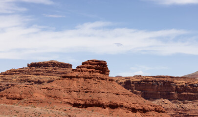 Fototapeta na wymiar American Landscape in the Desert with Red Rock Mountain Formations. Mexican Hat, Utah, United States of America.
