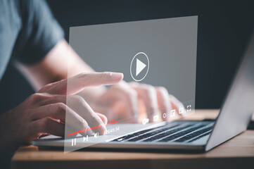 Businessman use laptop computer to watching and live streaming window. Online live stream window. Video streaming on internet concept.
