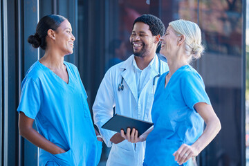 Diversity, teamwork and healthcare, a team of doctors talking and laughing outside a hospital. A...