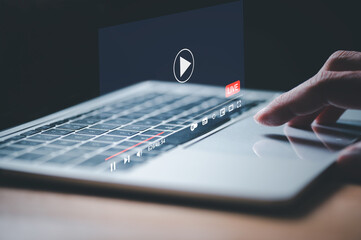 Businessman use laptop computer to watching and live streaming window. Online live stream window. Video streaming on internet concept.