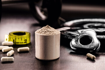 Measuring Spoon with Creatine or Whey, Food Supplement, Casein Cocktail, Muscle Mass Vitamin, Plated, Bodybuilding Concept