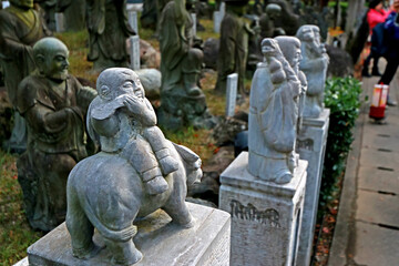 Fototapeta premium Detail of the stone statue in temple 