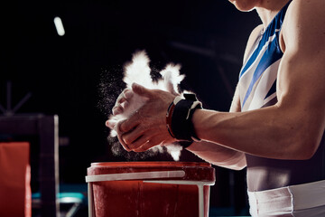 Gym, fitness and training, chalk on hands for weight lifting or cross bar gymnastics. Motivation...