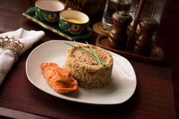 Chaufa chinese fried rice with fried fish Buffet table Peruvian comfort restaurant gourmet food