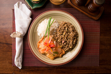 Escabeche fried fish with onions and lentils stew white rice Buffet table Peruvian comfort restaurant gourmet food