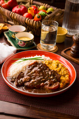Fried cow liver with locro pumpkin stew Buffet table Peruvian comfort restaurant gourmet food
