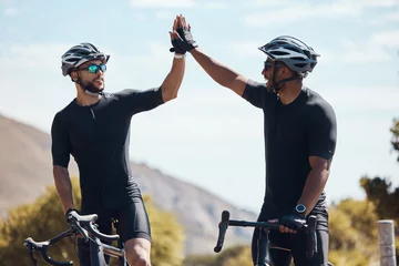 Foto op Canvas High five, winner and cycling team of cyclists having fun riding together outdoors in nature. Happy, excited and fit male bicycle riders on a break after exercising and training in the environment © Clement Coetzee/peopleimages.com