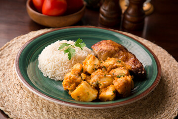 Roasted chicken with potato stew Peruvian comfort restaurant gourmet food
