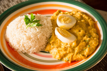 Aji de gallina chicken cream boiled eggs Peruvian comfort restaurant gourmet food