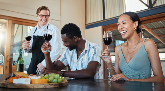 Waiter, diversity friends or wine tasting farm with red alcohol drink glass on countryside restaurant. Happy smile or learning couple bonding or laughing with winery server on sustainability vineyard