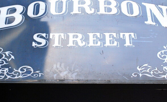 Bourbon street sign posted in New Orleans, Louisiana.