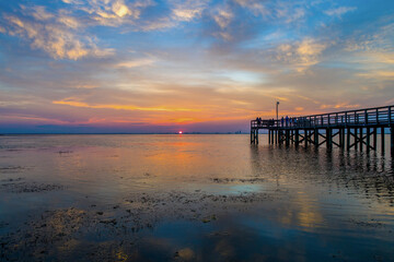Pier at sunset on Mobile Bay