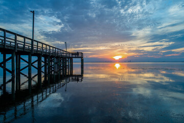 Pier on Mobile Bay at sunset