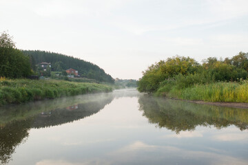 River in nature on a summer day, early in the morning
