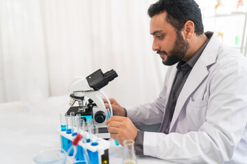 The scientist doctor created a vaccine against the coronavirus.Coronavirus 2019-nCoV Blood Sample. virus outbreaking.Technician holding blood tube test in the research laboratory