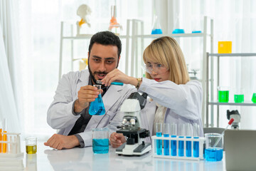 The scientist doctor created a vaccine against the coronavirus.Coronavirus 2019-nCoV Blood Sample. virus outbreaking.Technician holding blood tube test in the research laboratory