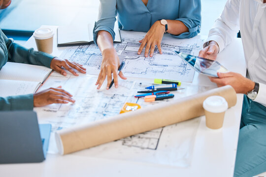 Architect blueprints, engineers and designers analyzing drawing, draft and sketch plan for construction project, layout and building. Closeup of team collaboration planning for property development
