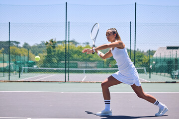 Fitness, exercise and sport with training tennis player playing competitive match at a tennis...