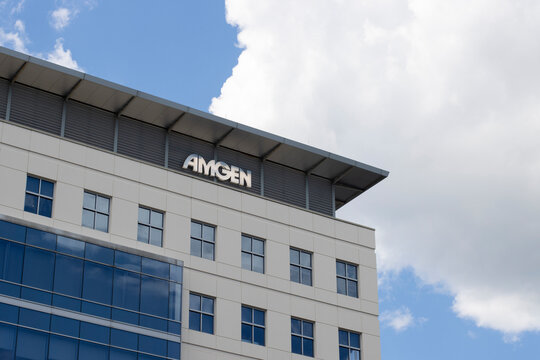 Cambridge, MA, USA - June 28, 2022: Exterior view of the office of Amgen, Inc., an American multinational biopharmaceutical company, in Cambridge, Massachusetts.